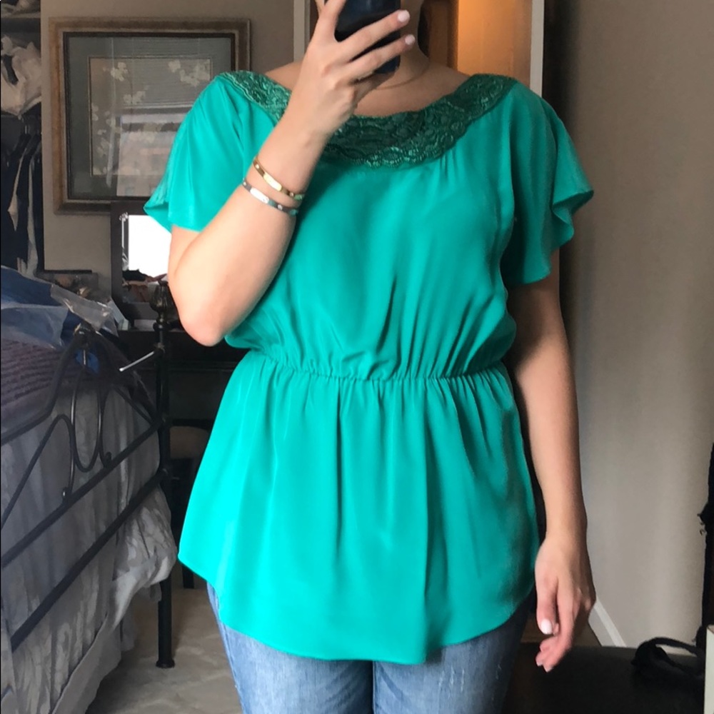 Gorgeous silk green top with beaded neckline